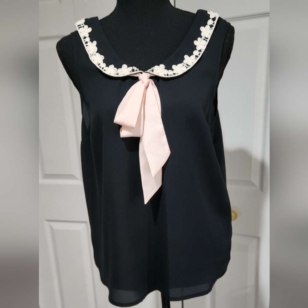 Chic Black Blouse with Pink Bow and Floral Trim